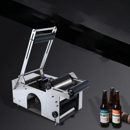 TEBAK Table-Top Electric Manual Labeling Machine for Round Bottles and Beverage Bottles Sticker Labeling Machine SY-50